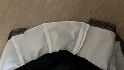 the white pleats have a gap in the edge lace
