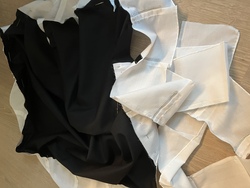 black skirt surrounded by the white strip