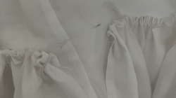 the end of the ruffles. it does not reach the start of the ruffles