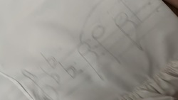sketch of music design on white skirt